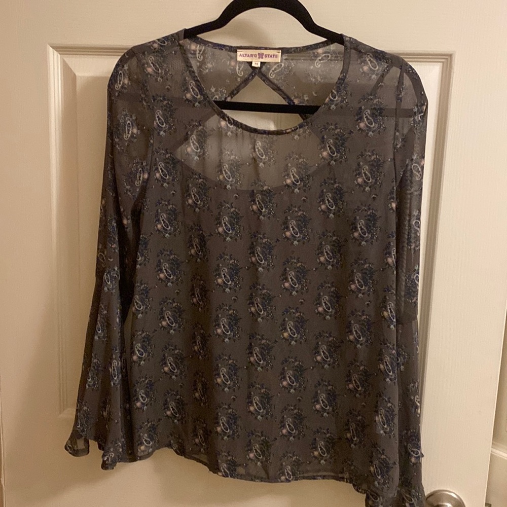 Sheer paisley shirt with open back. Size M